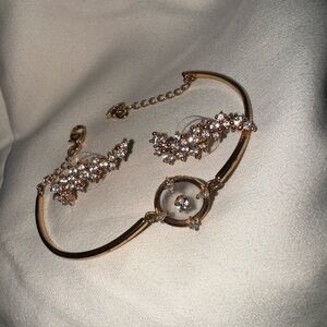 Swarovski rose gold bracelet and earrings set